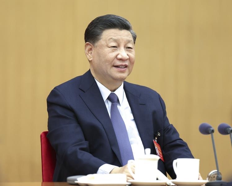 10月17日，習(xí)近平同志參加黨的二十大廣西代表團(tuán)討論。新華社記者 鞠鵬 攝